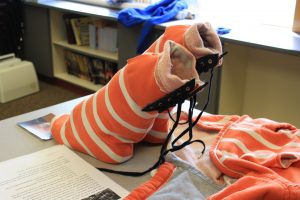 A student from the YHMA created a pair of boots using the sleeves of a jacket and unwanted sneakers.