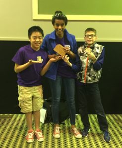 The Summit Technology Bowl Team #2 consisting of Kidan Girma, Isaac Kronberg, & Alex Nguyen pose for a picture