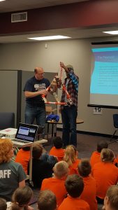 Bryan Burkhardt, left, explains what a payload is as part of the weather balloon launch at Horizon Elementary.