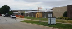 Photo of the construction work happening on the exterior of Johnston Middle School. 