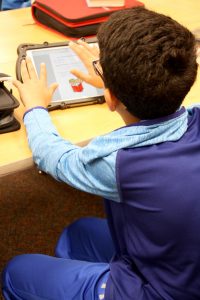 Student working on an ipad