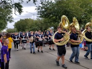 Photo of the marching band in the homecoming parade